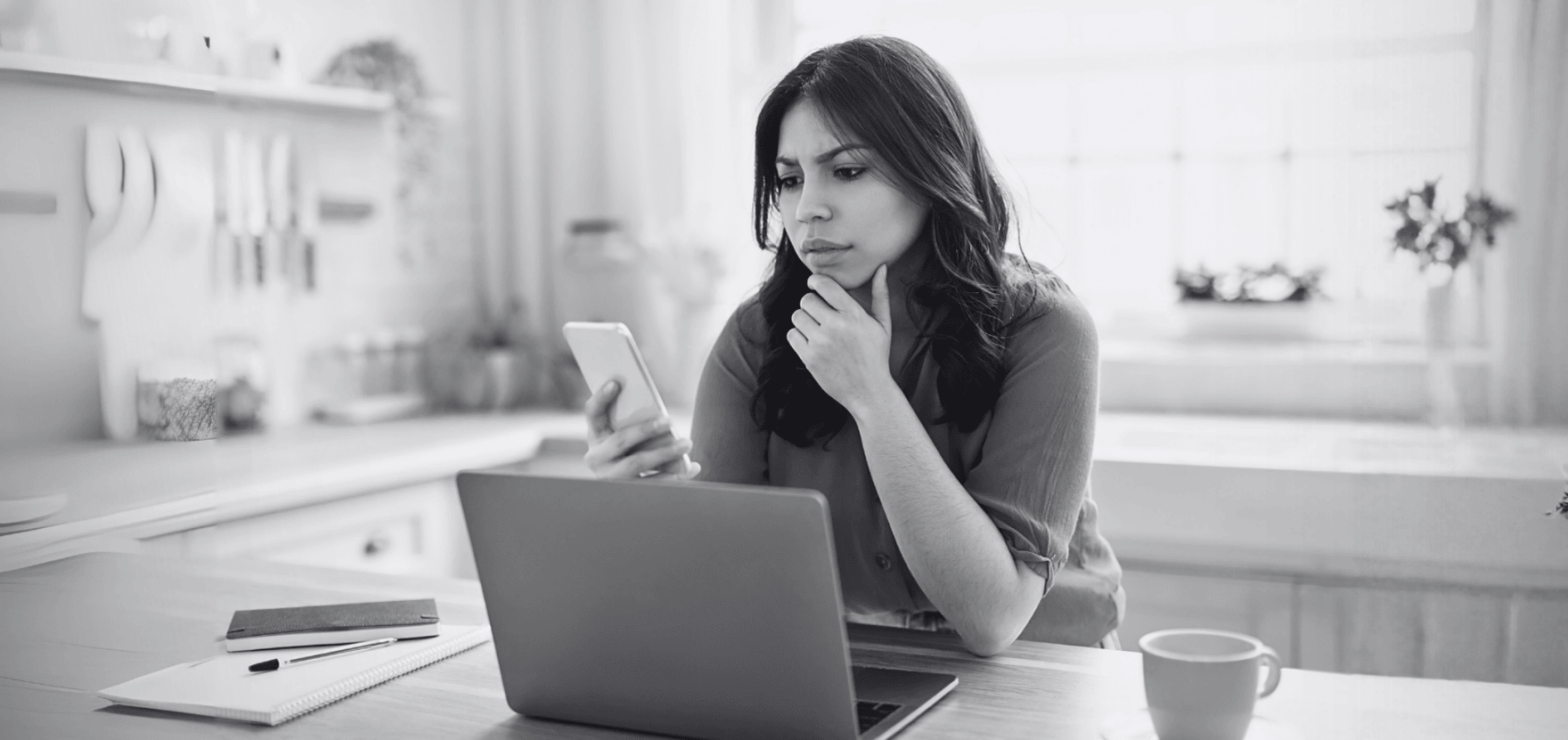 Woman on phone, trying to protect her money after falling for payment app fraud.
