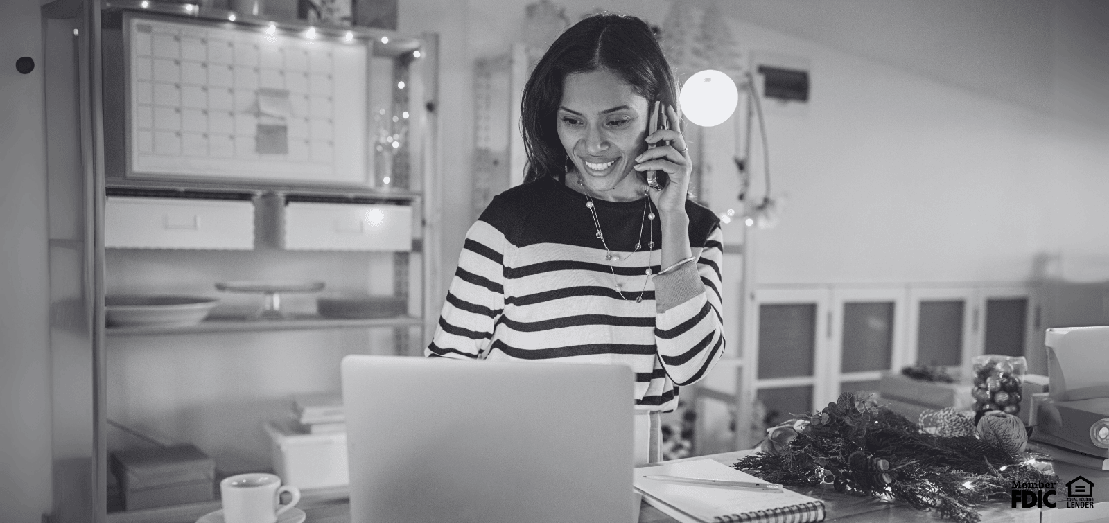 Small business owner viewing her business checking account.