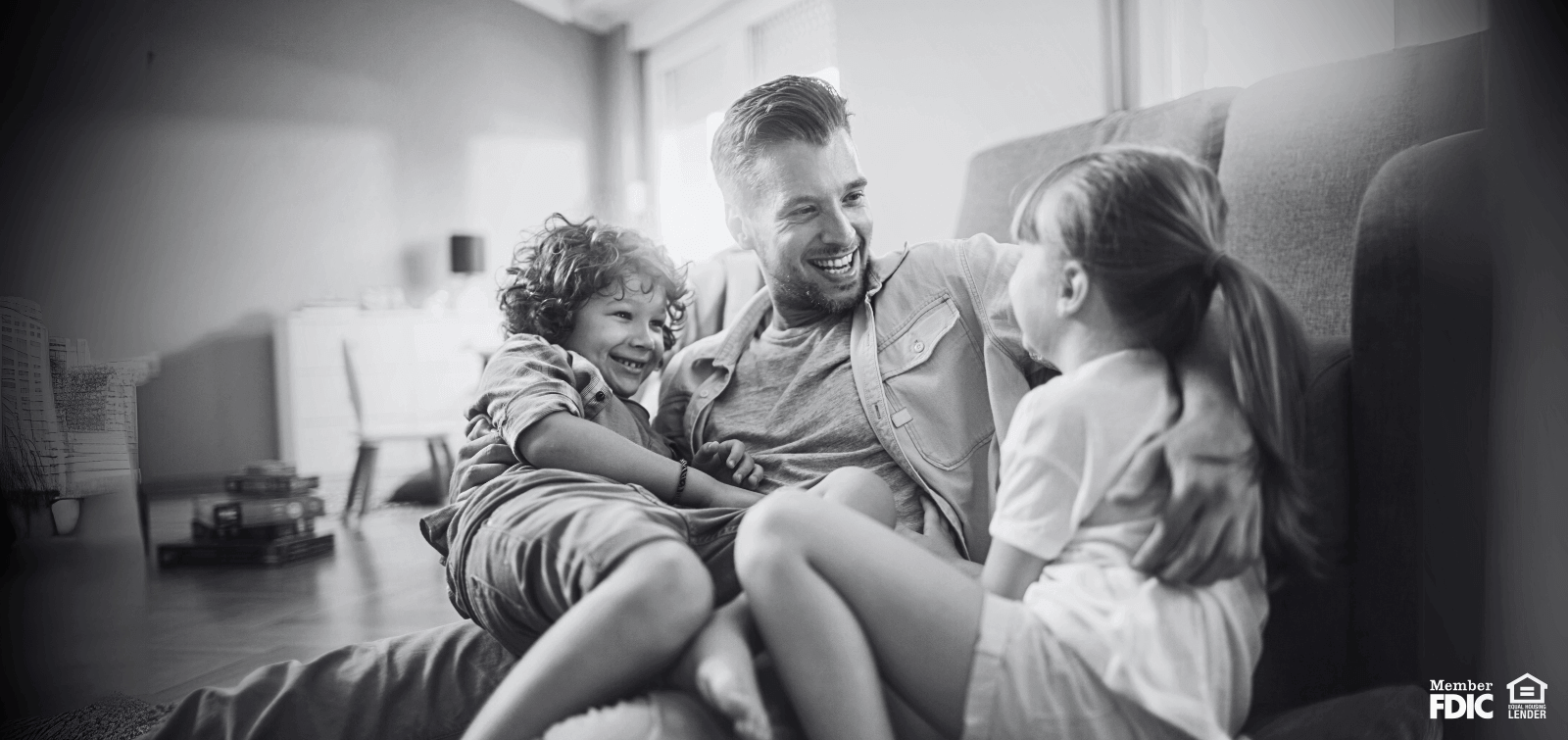 dad playing with two children