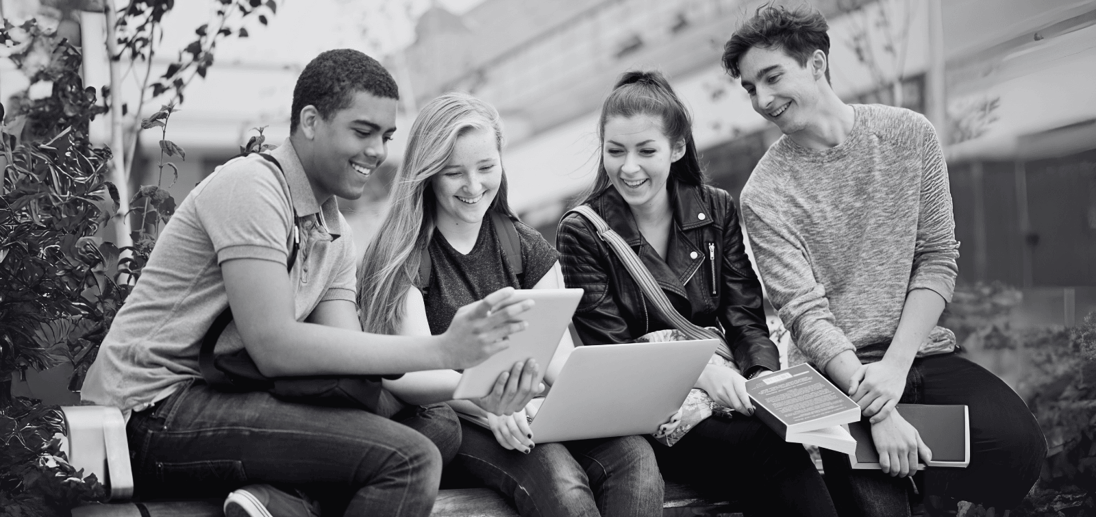 Group of students discussing their college bank accounts.
