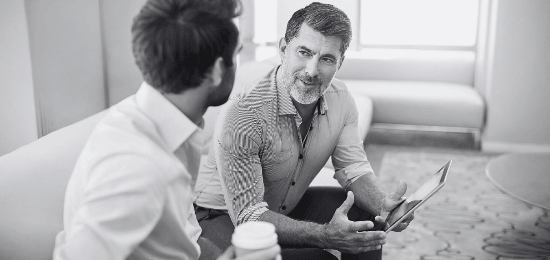 Treasury management specialist discussing the best solutions with a client.