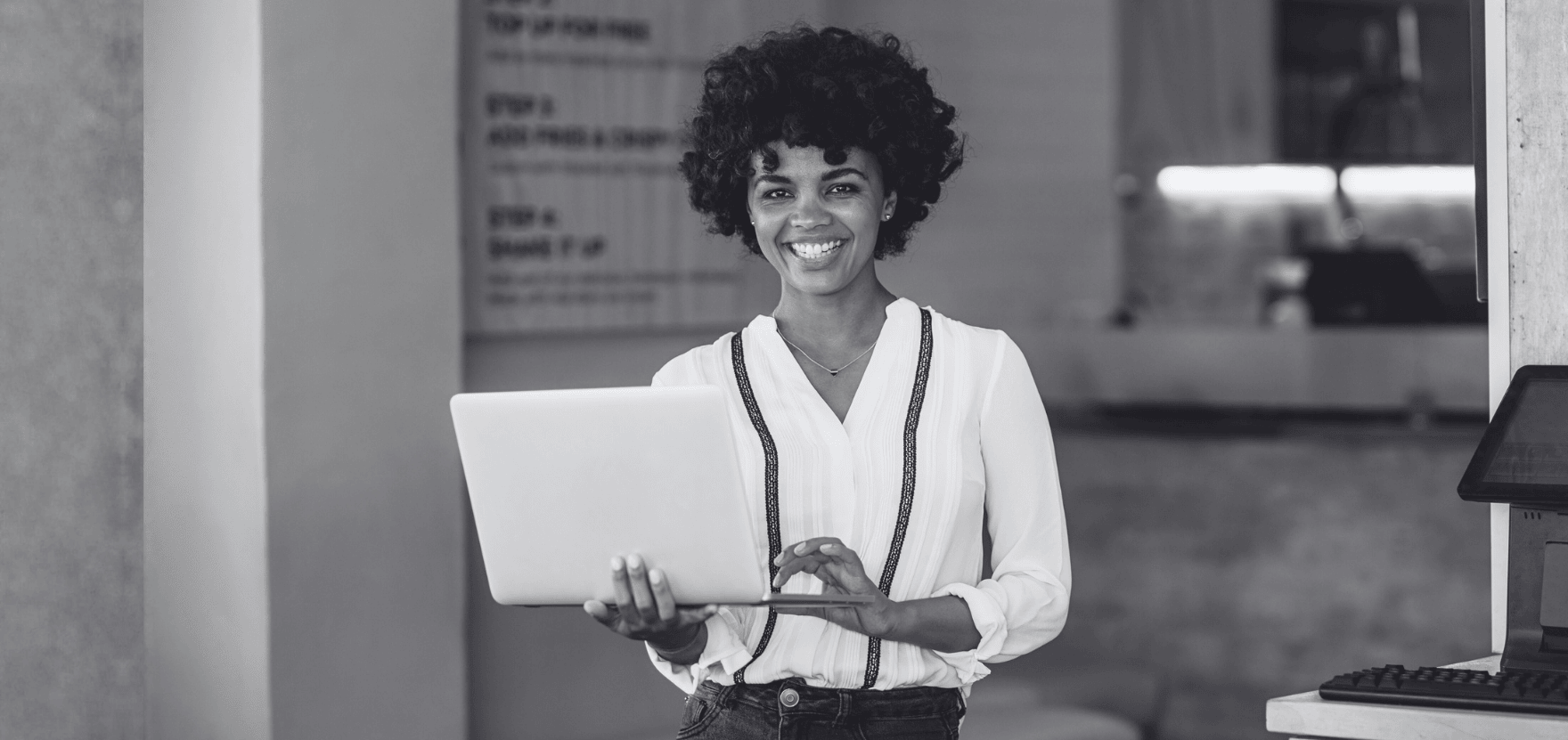 Small business owner growing her company with a SBA loan, thanks to SBA Approved Lenders.