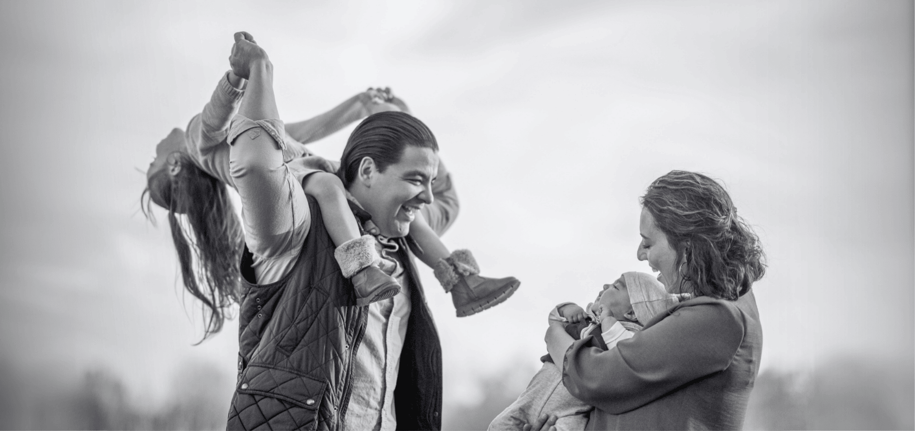 Carefree family enjoying the benefits of high money market interest rates for their family savings.
