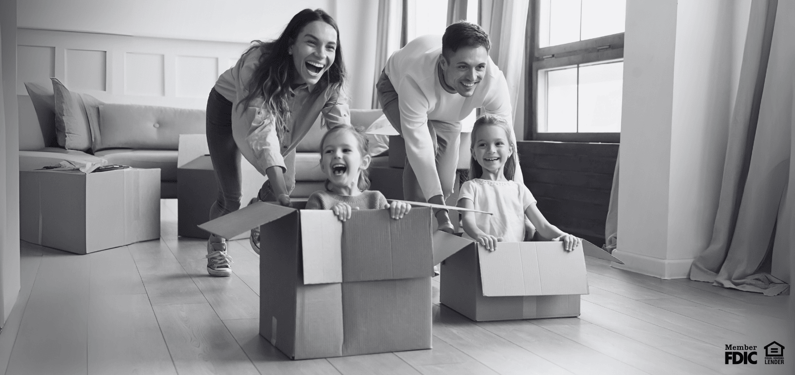 Family of four moving into their new home, thanks to a mortgage appraisal waiver.